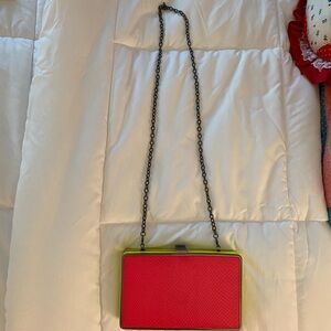 Chic hot pink and neon yellow Clutch with Chain Strap.